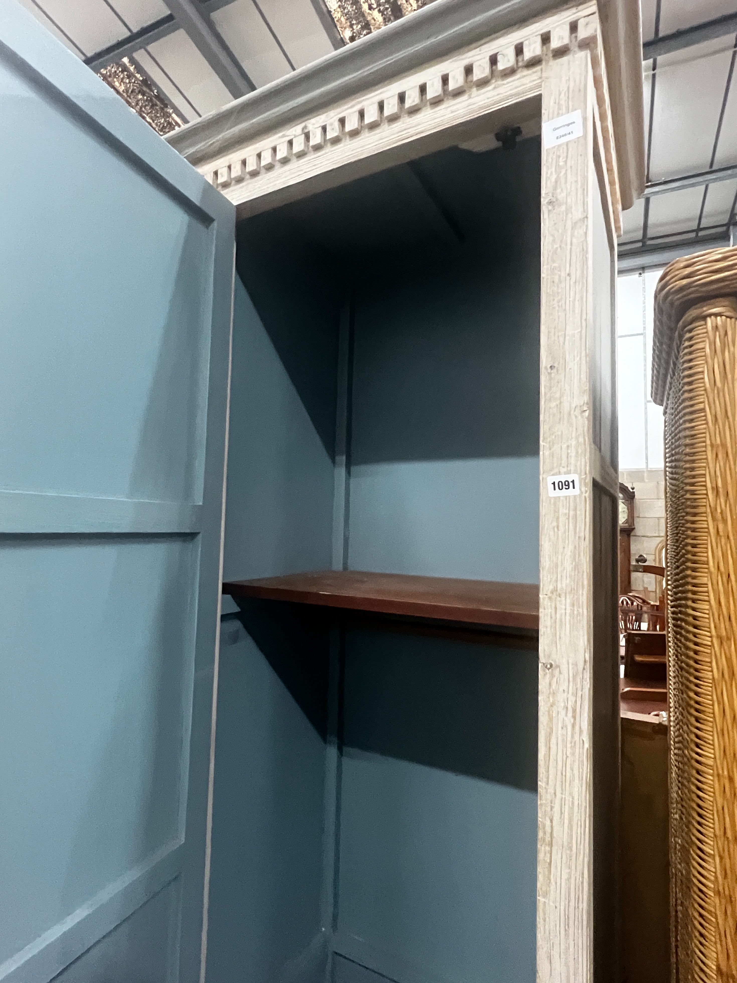 A contemporary Oka painted narrow wardrobe, width 72cm, depth 50cm, height 219cm